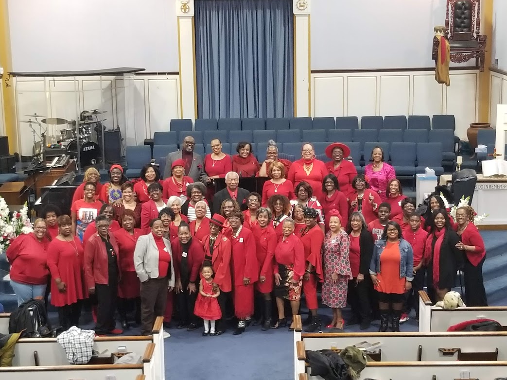 El Bethel Prayer Warriors - Women in red gathering in the sanctuary